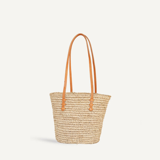 Forstera Handwoven Raffia Mini Tote Bag featuring natural textures and artisanal charm—perfect for effortless everyday style